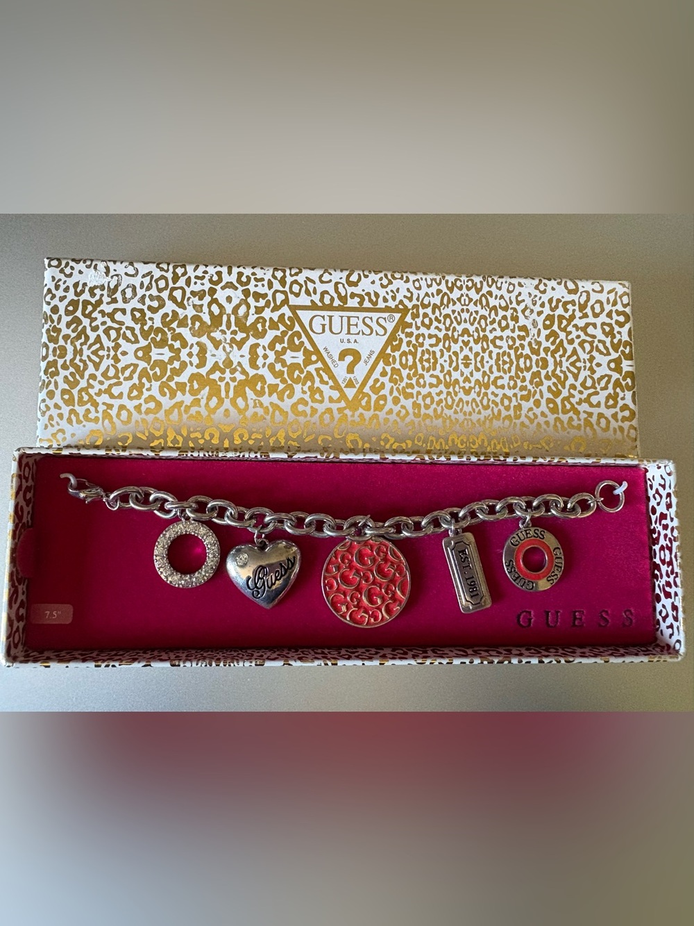 Guess Silver-Tone Charm Bracelet with Pink Enamel Logo Disc